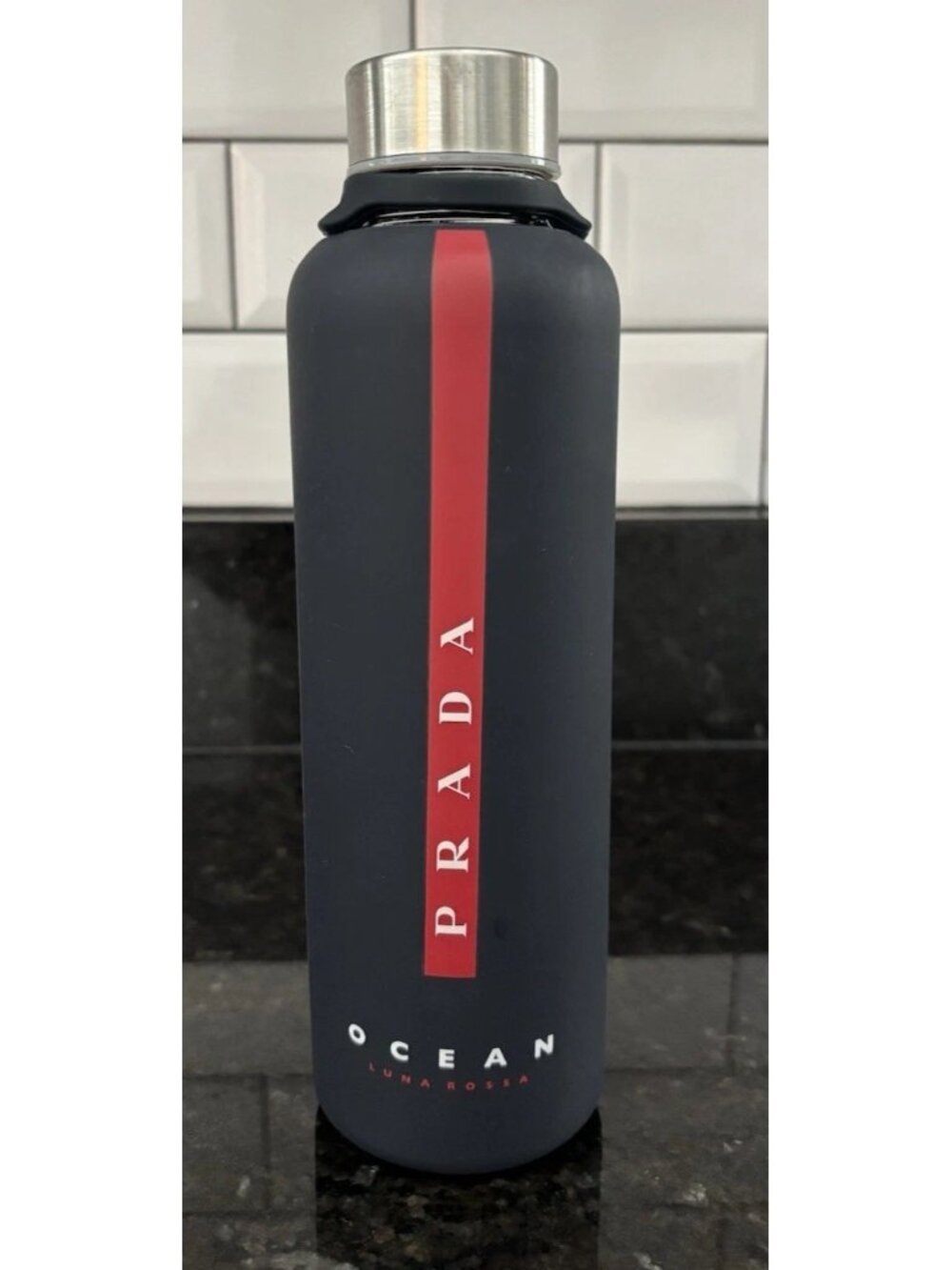 Prada Luna Rossa Ocean Glass Twist Top Water Bottle & Silicone Sleeve Black Red